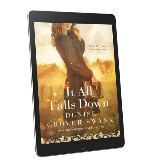 Tablet displaying the book cover of 'It All Falls Down' by Denise Grover Swank on a white background